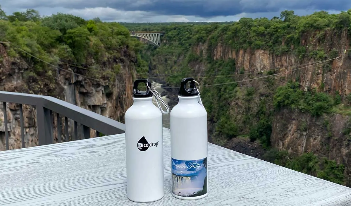 Two Ecodrop bottles on the railing above the Batoka Gorge